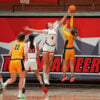 Rachel Cockman jumps for the basketball during a game.