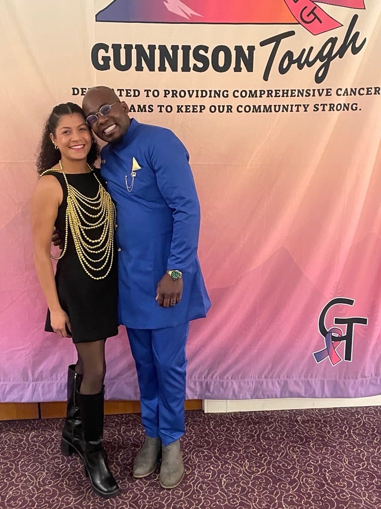 Jermaine poses with his partner at the Gunnison Tough event.