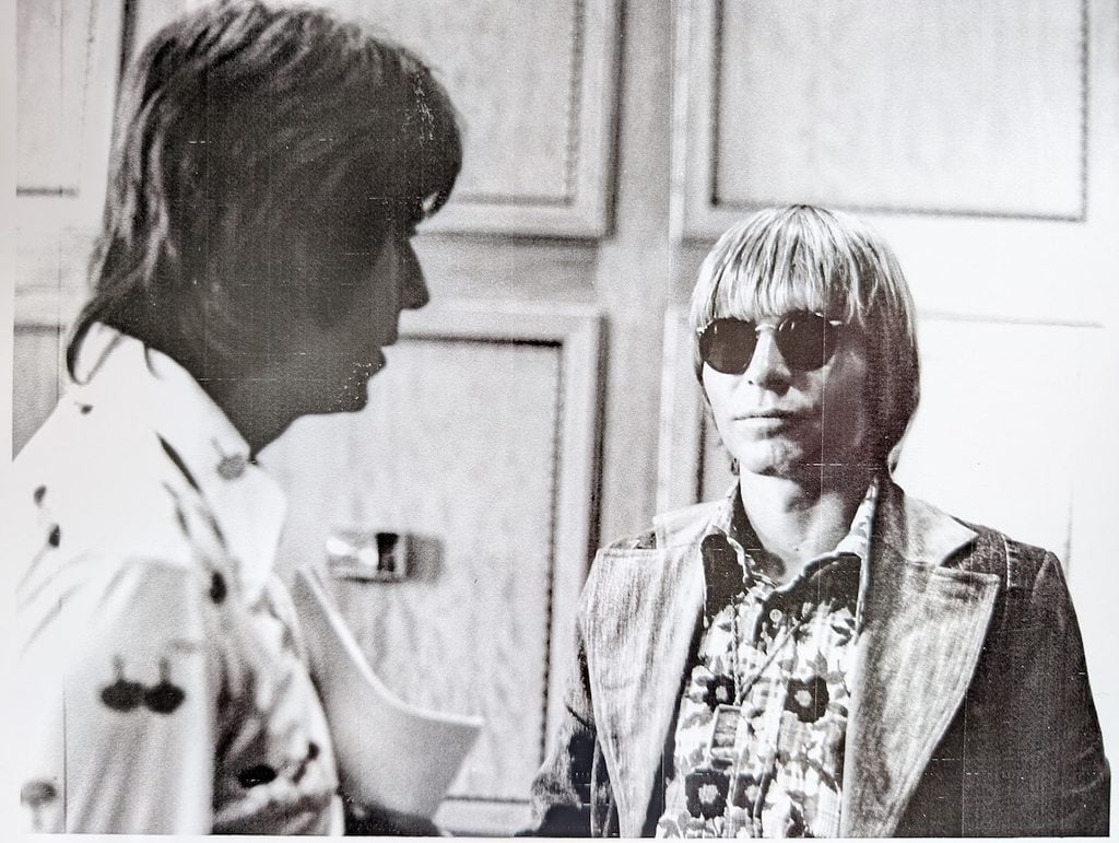 Larry with John Denver.